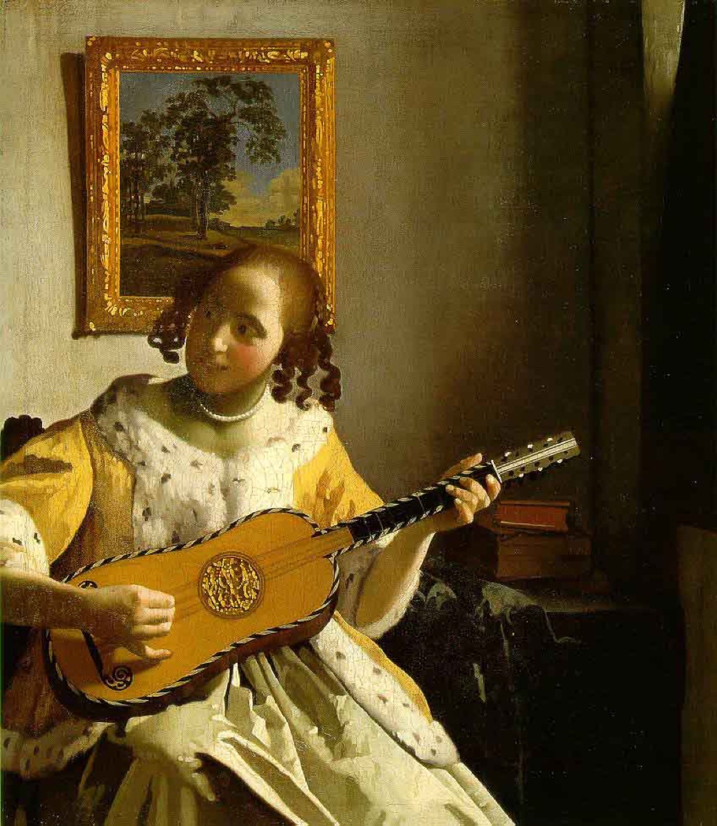 Une femme jouant de la guitare - Jan Vermeer